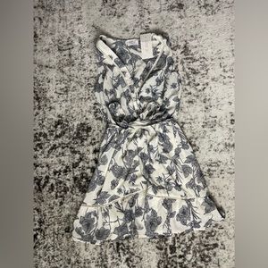 Black and white tie dress. Brand: Sienna sky. Size Small.